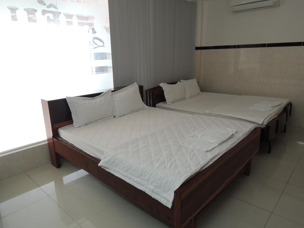 Hung Hieu Hotel Mỹ Tho Værelse billede